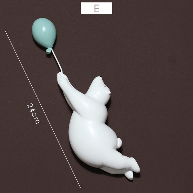 Escultura de Urso Polar com Balão Nanu