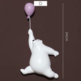 Escultura de Urso Polar com Balão Nanu