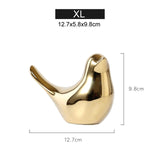 Estatueta de Pássaro Dourado Aurelia