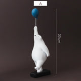 Escultura de Urso Polar com Balão Nanu